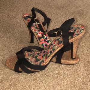 Black straps with corkscrew heel